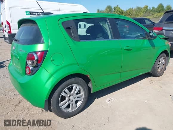 2015 Chevrolet Sonic LT with VIN 1G1JC6SG9F4109401, listed as a IAAI auction lot 43246008 with 114,226 mi miles and . Bid and sale history available at DreamBid. Image 4.