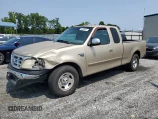 1999 Ford F-150 с VIN 1FTRX17W1XNB82405, выставлен на аукционе Copart как лот 59284925 с пробегом 207 345 миль миль и Списание • Salvage title. История ставок и продаж доступна на DreamBid. Изображение 1.