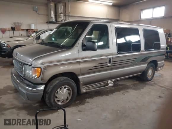 2002 Ford Econoline Cargo Recreational with VIN 1FDRE14L22HB53224, listed as a IAAI auction lot 41967017 with 202,065 mi miles and . Bid and sale history available at DreamBid. Image 2.