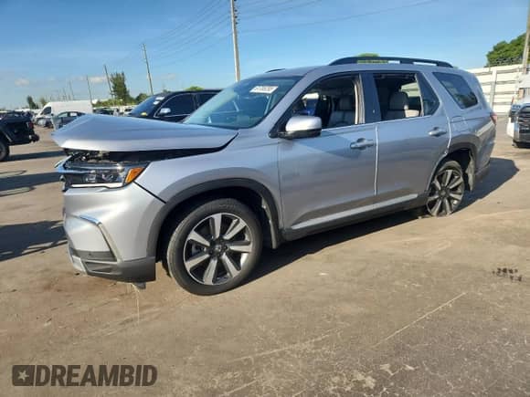 2025 Honda Pilot Touring с VIN 5FNYG2H75SB013004, выставлен на аукционе Copart как лот 61755295 с пробегом 47 661 миль миль и Списание • Salvage title. История ставок и продаж доступна на DreamBid. Изображение 1.