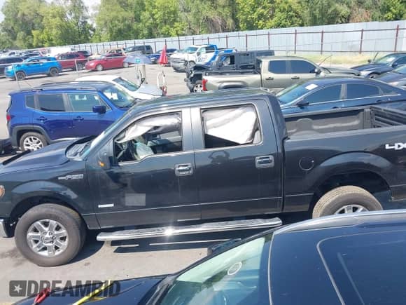 2014 Ford F-150 XL с VIN 1FTFW1ET7EKE46952, выставлен на аукционе IAAI как лот 43107348 с пробегом 150 407 миль миль и . История ставок и продаж доступна на DreamBid. Изображение 15.