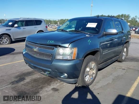 2009 Chevrolet Tahoe LTZ z VIN 1GNFK33279R126021, wystawiony jako IAAI lot #43441250 z przebiegiem 181 053 mil mil oraz . Historia ofert i sprzedaży dostępna na DreamBid. Obrazek 2.