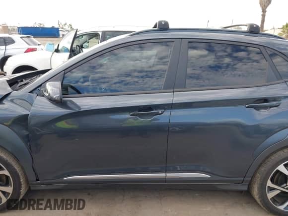 2022 Hyundai Kona Limited z VIN KM8K5CA34NU922867, wystawiony jako IAAI lot #43491070 z przebiegiem 29 575 mil mil oraz . Historia ofert i sprzedaży dostępna na DreamBid. Obrazek 13.