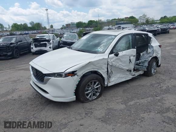 2024 Mazda CX-5 S Preferred z VIN JM3KFBCM7R0364230, wystawiony jako IAAI lot #41859044 z przebiegiem 13 899 mil mil oraz . Historia ofert i sprzedaży dostępna na DreamBid. Obrazek 2.
