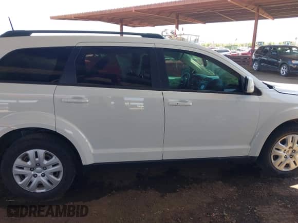 2018 Dodge Journey SXT z VIN 3C4PDCBG7JT533644, wystawiony jako IAAI lot #43122039 z przebiegiem 50 240 mil mil oraz . Historia ofert i sprzedaży dostępna na DreamBid. Obrazek 13.