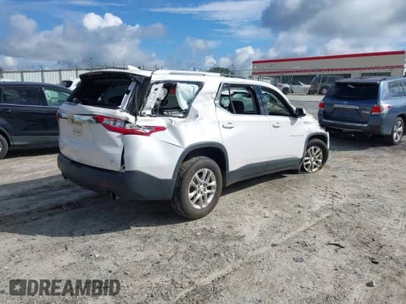 2018 Chevrolet Traverse LT Cloth with VIN 1GNERGKW5JJ232022, listed as a IAAI auction lot 42977703 with 108,073 mi miles and . Bid and sale history available at DreamBid. Image 4.
