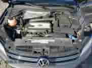 2014 Volkswagen Tiguan SEL with VIN WVGAV3AX8EW585929, listed as a Copart auction lot 61462205 with 63,899 mi miles and Salvage title. Bid and sale history available at DreamBid. Image 12.