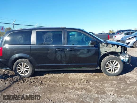 2019 Dodge Grand Caravan SXT with VIN 2C4RDGCG6KR725978, listed as a IAAI auction lot 43458165 with 182,803 mi miles and . Bid and sale history available at DreamBid. Image 13.