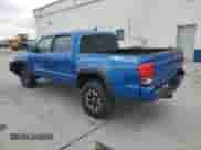 2016 Toyota Tacoma TRD Off Road with VIN 3TMCZ5AN0GM037079, listed as a Copart auction lot 70552345 with 141,399 mi miles and Salvage title. Bid and sale history available at DreamBid. Image 2.