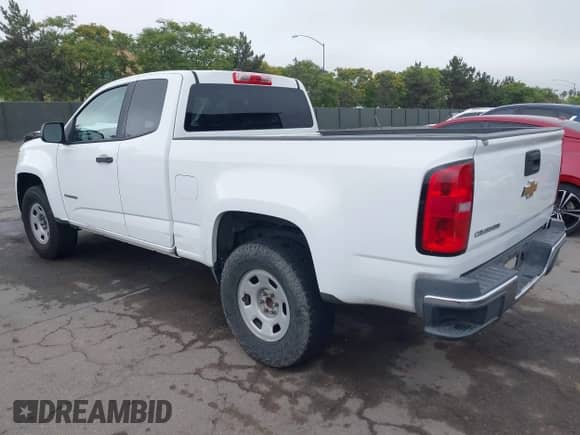 2015 Chevrolet Colorado 2WD WT z VIN 1GCHSAEA1F1205818, wystawiony jako IAAI lot #42391562 z przebiegiem 197 818 mil mil oraz . Historia ofert i sprzedaży dostępna na DreamBid. Obrazek 3.