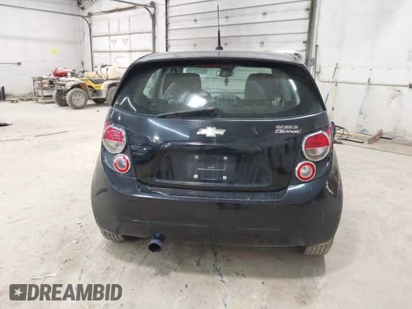 2012 Chevrolet Sonic LS with VIN 1G1JB6SH2C4217205, listed as a IAAI auction lot 43360675 with 101,863 mi miles and . Bid and sale history available at DreamBid. Image 16.