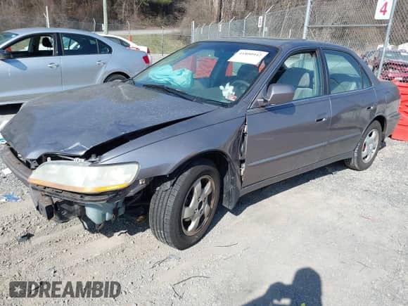2000 Honda Accord EX z VIN 1HGCG6673YA139045, wystawiony jako IAAI lot #41800942 z przebiegiem 194 181 mil mil oraz . Historia ofert i sprzedaży dostępna na DreamBid. Obrazek 2.