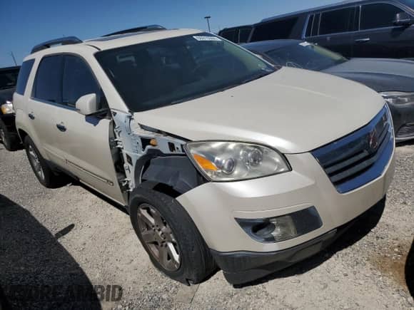2007 Saturn Outlook XR with VIN 5GZEV23717J174383, listed as a Copart auction lot 66915944 with 128,885 mi miles and Salvage title. Bid and sale history available at DreamBid. Image 4.
