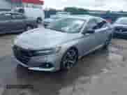 2021 Honda Accord Sport with VIN 1HGCV2F35MA004560, listed as a IAAI auction lot 42746583 with 63,997 mi miles and . Bid and sale history available at DreamBid. Image 2.