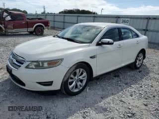 2010 Ford Taurus SEL with VIN 1FAHP2EW9AG113709, listed as a Copart auction lot 84959115 with 314,334 mi miles and Salvage title. Bid and sale history available at DreamBid. Image 1.