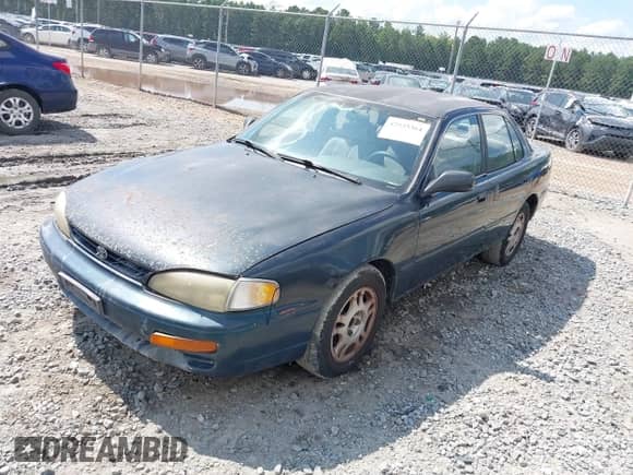 1995 Toyota Camry XLE with VIN 4T1GK13E1SU108821, listed as a IAAI auction lot 42535364 with 180,288 mi miles and . Bid and sale history available at DreamBid. Image 2.