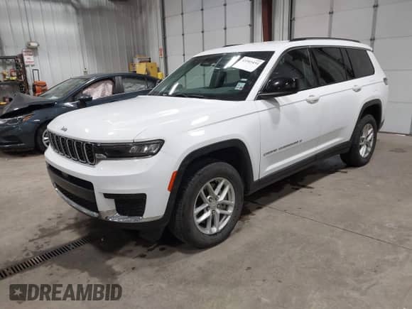 2023 Jeep Grand Cherokee Laredo with VIN 1C4RJJAG9P8901630, listed as a IAAI auction lot 43503454 with 63,607 mi miles and . Bid and sale history available at DreamBid. Image 17.