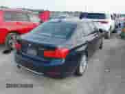 2014 BMW 3 Series 328i with VIN WBA3A5G54ENP33569, listed as a IAAI auction lot 43080874 with 225,673 mi miles and . Bid and sale history available at DreamBid. Image 4.