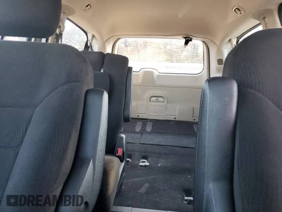 2012 Dodge Grand Caravan SE z VIN 2C4RDGBG4CR380789, wystawiony jako Copart lot #85951175 z przebiegiem 199 556 mil mil oraz Czysty tytuł • Clean title. Historia ofert i sprzedaży dostępna na DreamBid. Obrazek 10.