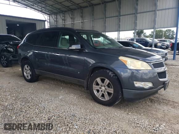 2010 Chevrolet Traverse 2LT с VIN 1GNLRGED2AS154732, выставлен на аукционе Copart как лот 82170025 с пробегом 252 608 миль миль и Списание • Salvage title. История ставок и продаж доступна на DreamBid. Изображение 4.