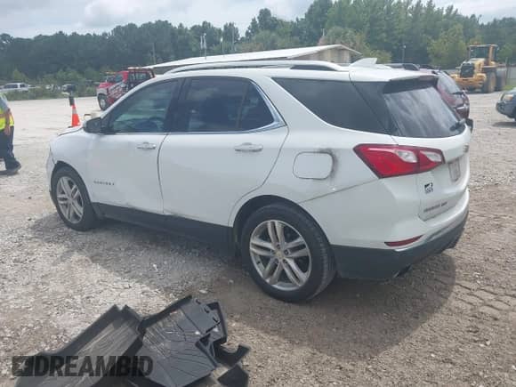 2018 Chevrolet Equinox Premier with VIN 2GNAXNEXXJ6338654, listed as a IAAI auction lot 43047391 with 97,169 mi miles and . Bid and sale history available at DreamBid. Image 3.