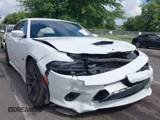 2021 Dodge Charger Scat Pack with VIN 2C3CDXGJ7MH588266, listed as a IAAI auction lot 42716503 with 58,462 mi miles and . Bid and sale history available at DreamBid. Image 1.