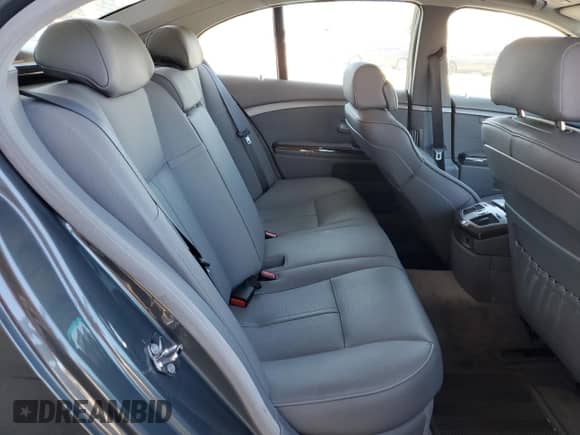 2004 BMW 7 Series 745i z VIN WBAGL63534DP73170, wystawiony jako Copart lot #64250965 z przebiegiem 90 716 mil mil oraz Czysty tytuł • Clean title. Historia ofert i sprzedaży dostępna na DreamBid. Obrazek 10.