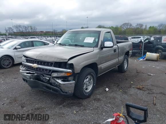 1999 Chevrolet Silverado 1500 LS z VIN 1GCEK14T3XZ161362, wystawiony jako IAAI lot #41973905 z przebiegiem 153 845 mil mil oraz . Historia ofert i sprzedaży dostępna na DreamBid. Obrazek 2.