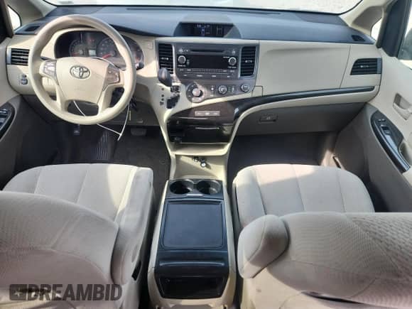 2012 Toyota Sienna LE с VIN 5TDKK3DC6CS272000, выставлен на аукционе Copart как лот 81020445 с пробегом 118 524 миль миль и Списание • Salvage title. История ставок и продаж доступна на DreamBid. Изображение 8.