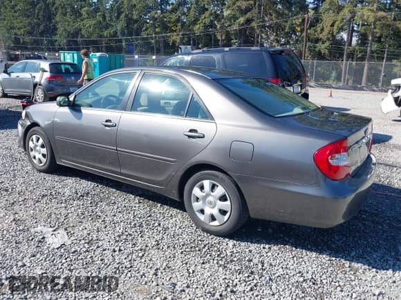 2003 Toyota Camry LE with VIN JTDBE32K530180767, listed as a IAAI auction lot 43276458 with 189,568 mi miles and . Bid and sale history available at DreamBid. Image 3.