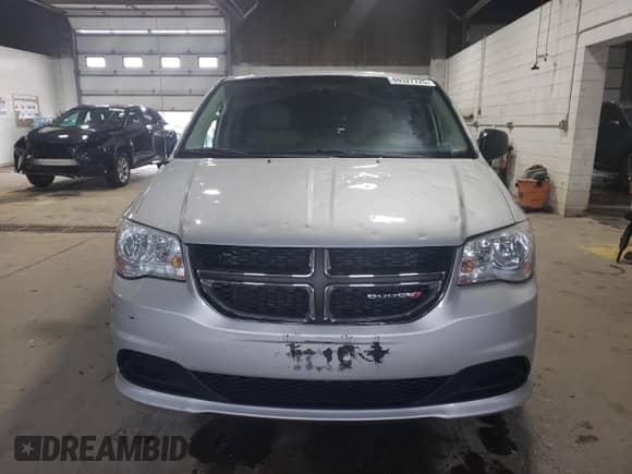 2012 Dodge Grand Caravan American Value z VIN 2C4RDGBGXCR105234, wystawiony jako Copart lot #69327725 z przebiegiem 141 911 mil mil oraz Szkoda całkowita • Salvage title. Historia ofert i sprzedaży dostępna na DreamBid. Obrazek 5.