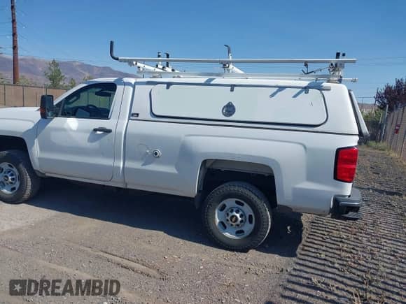 2015 Chevrolet Silverado 2500HD Work Truck with VIN 1GC0KUEG3FZ531558, listed as a IAAI auction lot 43226136 with 241,382 mi miles and . Bid and sale history available at DreamBid. Image 14.