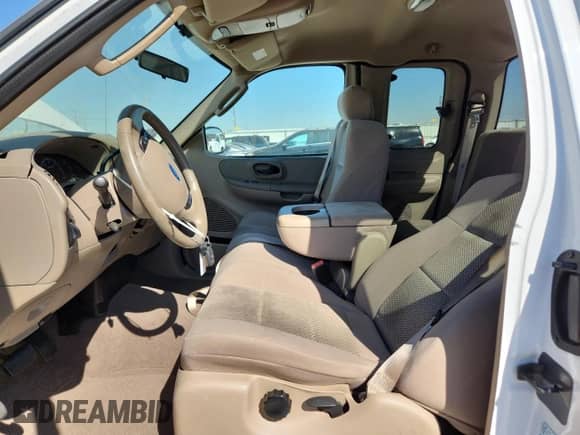 2003 Ford F-150 XL z VIN 2FTRX17L63CB07124, wystawiony jako Copart lot #86682935 z przebiegiem 101 788 mil mil oraz Szkoda całkowita • Salvage title. Historia ofert i sprzedaży dostępna na DreamBid. Obrazek 7.