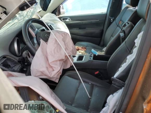 2011 Jeep Grand Cherokee 70th Anniversary with VIN 1J4RR4GG6BC646162, listed as a Copart auction lot 64792705 with Not provided miles and Salvage title. Bid and sale history available at DreamBid. Image 7.