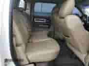 2012 Ram 1500 Laramie z VIN 1C6RD6NT6CS223743, wystawiony jako Copart lot #86374094 z przebiegiem 144 248 mil mil oraz Szkoda całkowita • Salvage title. Historia ofert i sprzedaży dostępna na DreamBid. Obrazek 10.