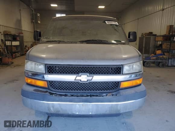 2009 Chevrolet Express Passenger с VIN 1GAGG25K691140635, выставлен на аукционе Copart как лот 88503195 с пробегом 144 026 миль миль и Списание • Salvage title. История ставок и продаж доступна на DreamBid. Изображение 5.