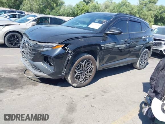 2022 Hyundai Tucson N Line z VIN KM8JFCAEXNU124027, wystawiony jako IAAI lot #42754562 z przebiegiem 68 770 mil mil oraz . Historia ofert i sprzedaży dostępna na DreamBid. Obrazek 2.