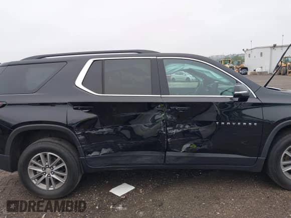 2023 Chevrolet Traverse LT with VIN 1GNEVHKW2PJ224793, listed as a IAAI auction lot 42515312 with 36,153 mi miles and . Bid and sale history available at DreamBid. Image 6.
