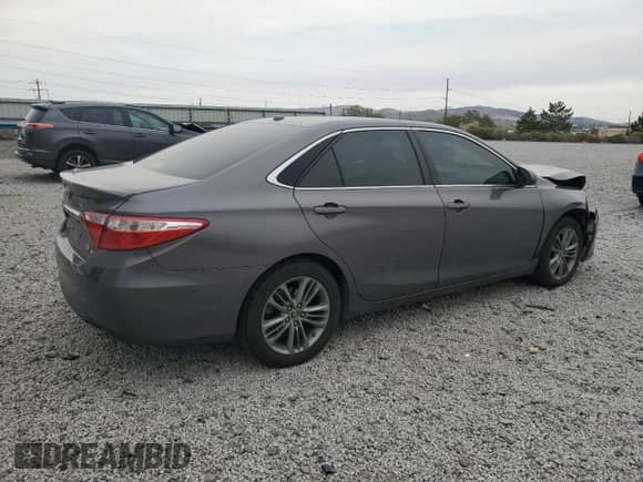 2015 Toyota Camry LE с VIN 4T1BD1FKXFU169791, выставлен на аукционе Copart как лот 71256235 с пробегом 94 734 миль миль и Списание • Salvage title. История ставок и продаж доступна на DreamBid. Изображение 3.