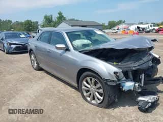 2015 Chrysler 300 Limited with VIN 2C3CCARG3FH923477, listed as a IAAI auction lot 42988981 with 48,095 mi miles and . Bid and sale history available at DreamBid. Image 1.