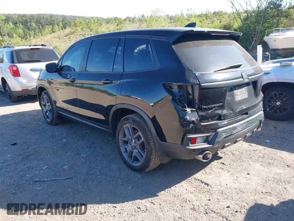 2022 Honda Passport EX-L with VIN 5FNYF7H57NB004890, listed as a IAAI auction lot 42032854 with 53,642 mi miles and . Bid and sale history available at DreamBid. Image 3.