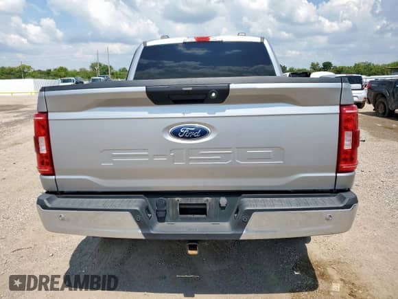 2023 Ford F-150 XL z VIN 1FTFW1E53PKG01775, wystawiony jako Copart lot #71097185 z przebiegiem 25 044 mil mil oraz Szkoda całkowita • Salvage title. Historia ofert i sprzedaży dostępna na DreamBid. Obrazek 6.