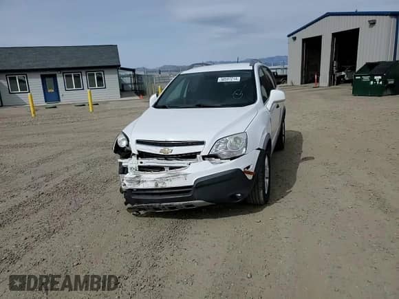 2014 Chevrolet Captiva Sport LS с VIN 3GNAL2EK2ES659173, выставлен на аукционе Copart как лот 50597214 с пробегом 125 279 миль миль и Списание • Salvage title. История ставок и продаж доступна на DreamBid. Изображение 11.