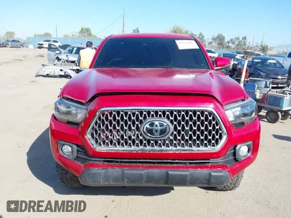 2021 Toyota Tacoma SR z VIN 5TFCZ5AN0MX262902, wystawiony jako IAAI lot #43535009 z przebiegiem 70 926 mil mil oraz . Historia ofert i sprzedaży dostępna na DreamBid. Obrazek 11.