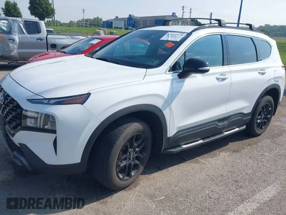 2023 Hyundai Santa Fe XRT with VIN 5NMS6DAJ1PH526783, listed as a IAAI auction lot 42891975 with 45,761 mi miles and . Bid and sale history available at DreamBid. Image 2.
