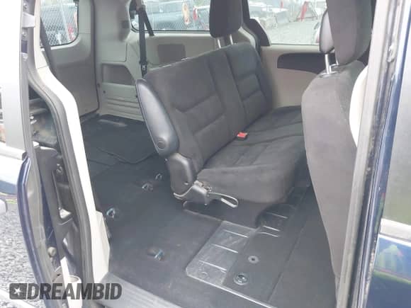 2014 Dodge Grand Caravan SE with VIN 2C4RDGBG0ER187249, listed as a IAAI auction lot 42143078 with 119,097 mi miles and . Bid and sale history available at DreamBid. Image 8.
