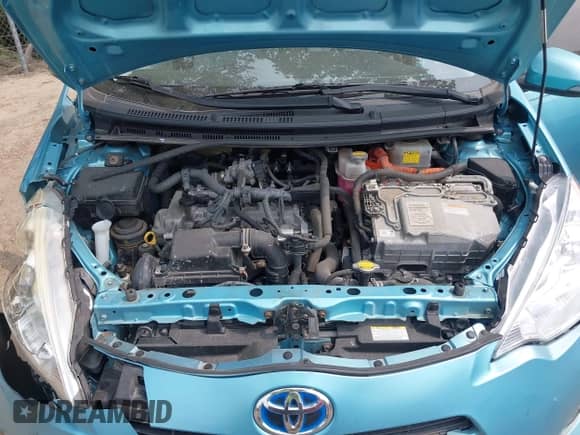 2014 Toyota Prius One z VIN JTDKDTB34E1086145, wystawiony jako IAAI lot #42428935 z przebiegiem 121 874 mil mil oraz . Historia ofert i sprzedaży dostępna na DreamBid. Obrazek 10.