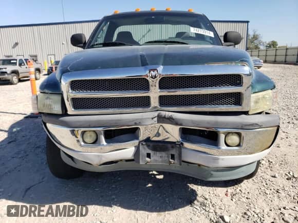 1999 Dodge 2500 with VIN 3B7KF26Z4XM515499, listed as a Copart auction lot 74273914 with 99,380 mi miles and Clean title. Bid and sale history available at DreamBid. Image 5.