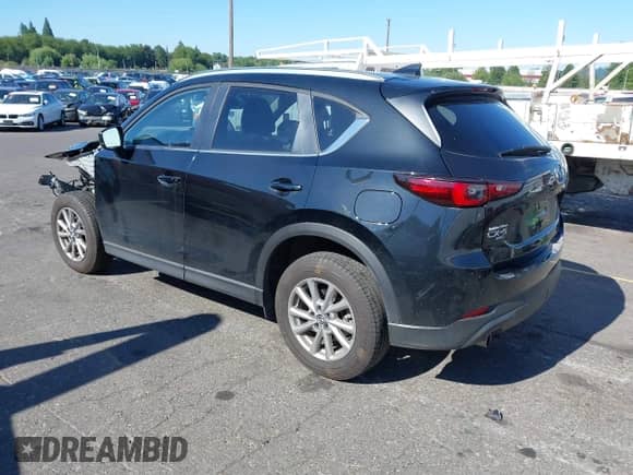 2023 Mazda CX-5 S Select z VIN JM3KFBBM7P0186768, wystawiony jako IAAI lot #42808214 z przebiegiem 16 236 mil mil oraz . Historia ofert i sprzedaży dostępna na DreamBid. Obrazek 3.