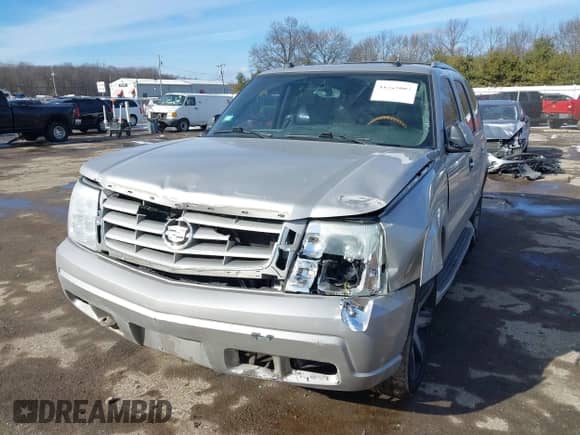 2004 Cadillac Escalade z VIN 1GYEK63N74R226915, wystawiony jako IAAI lot #41529807 z przebiegiem Nie podano mil oraz . Historia ofert i sprzedaży dostępna na DreamBid. Obrazek 2.